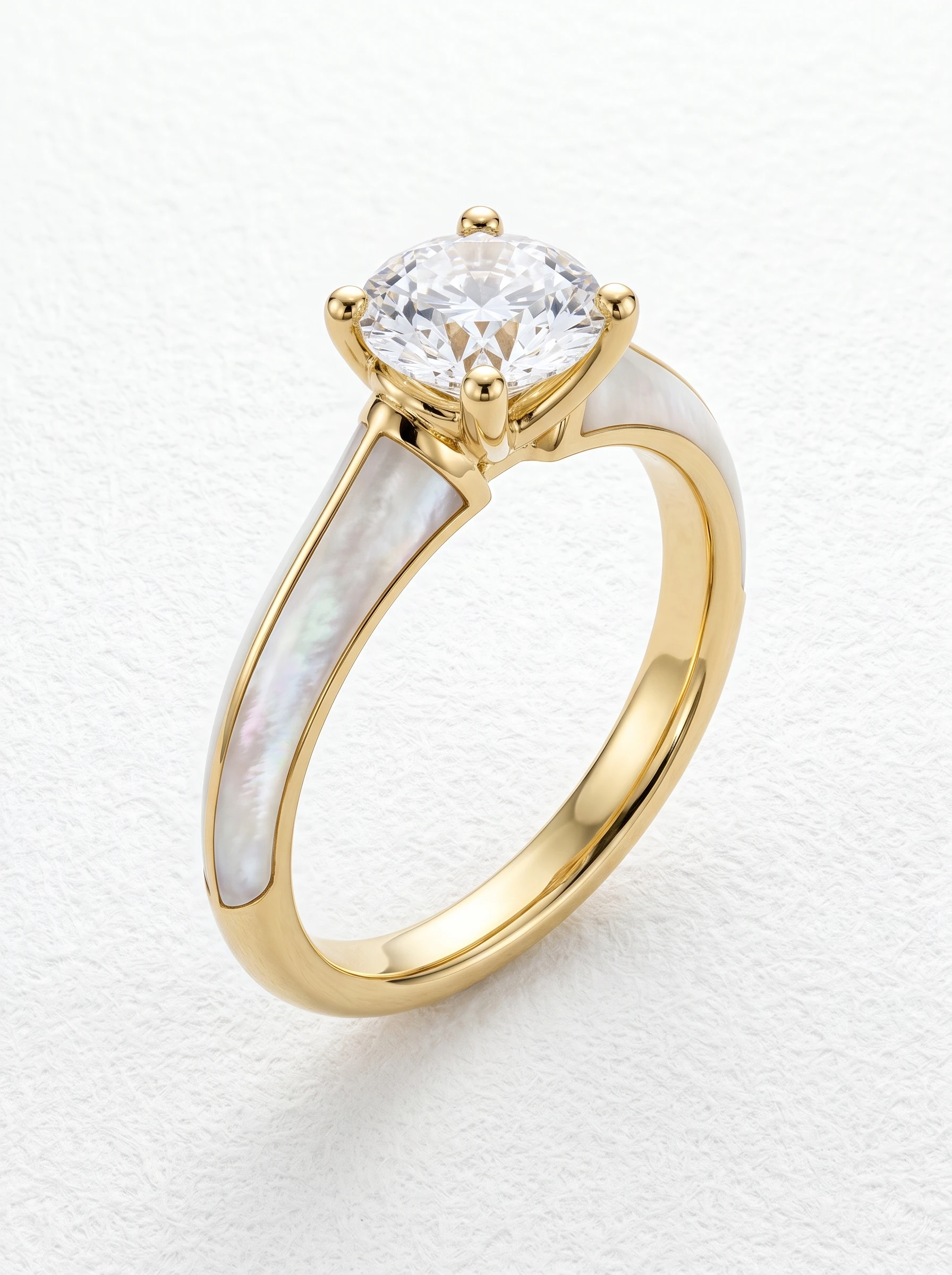 Mother of pearl solitaire engagement ring in yellow gold standing upright, round brilliant on four claw prongs