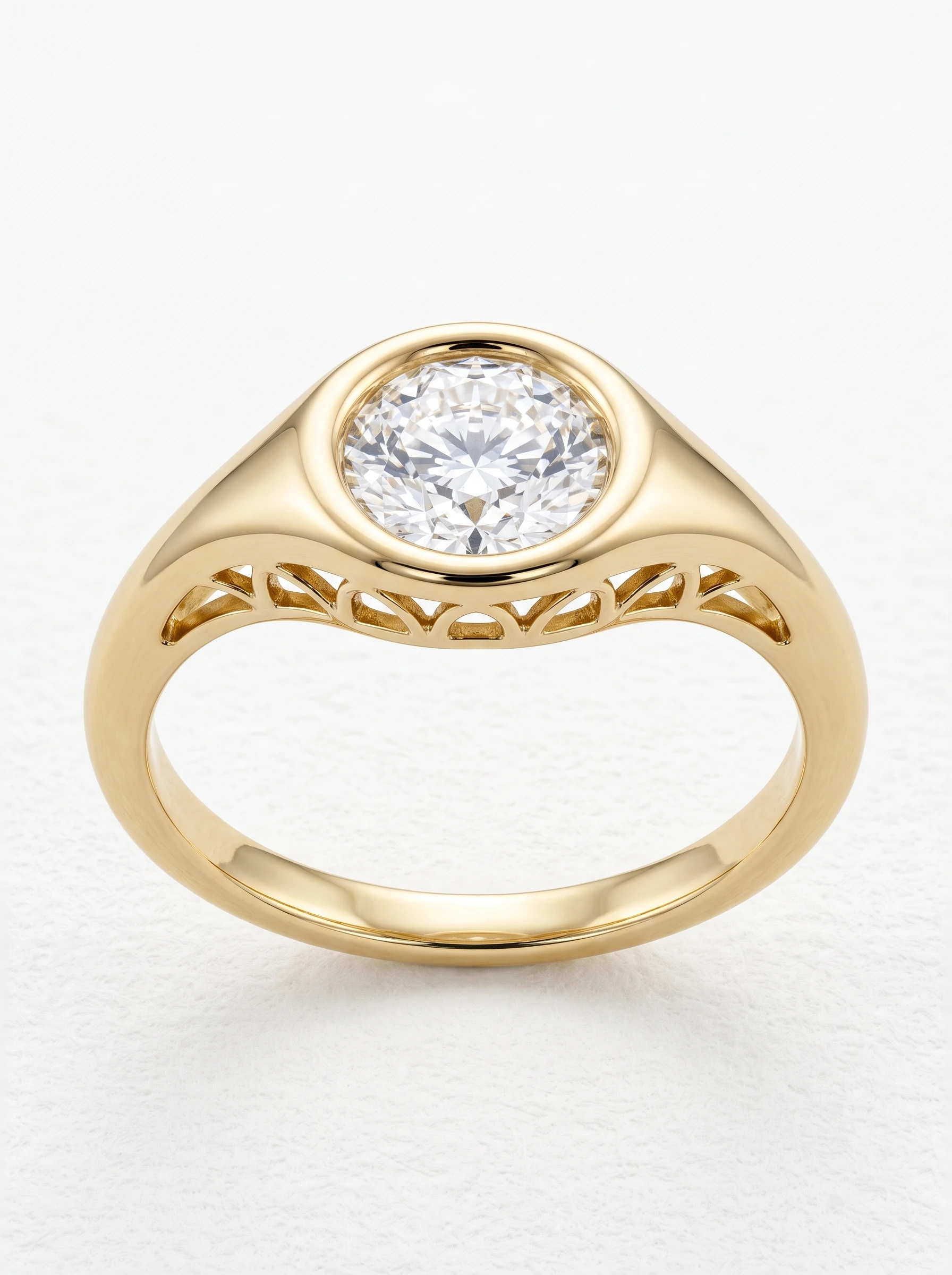 Round bezel signet engagement ring in yellow gold, front view of the flush-set round diamond and tapered band