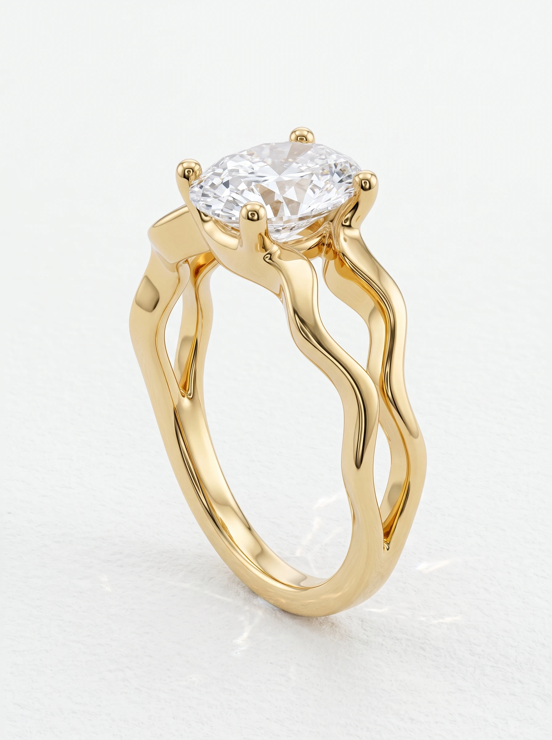 Oval wavy split shank engagement ring in yellow gold standing upright, four ball-tipped claw prongs
