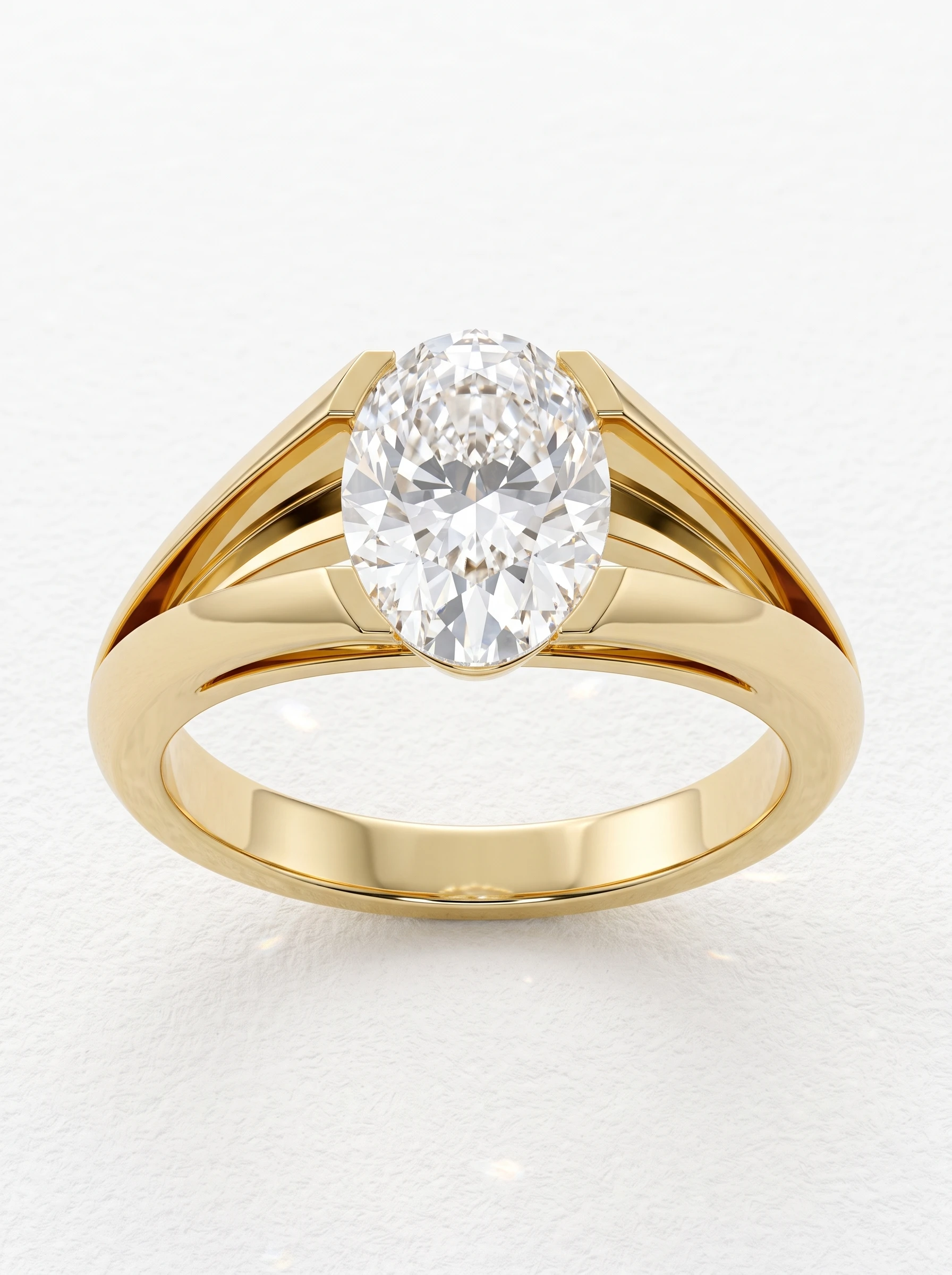 Oval bar set split shank engagement ring in yellow gold standing upright, four flat bar prongs