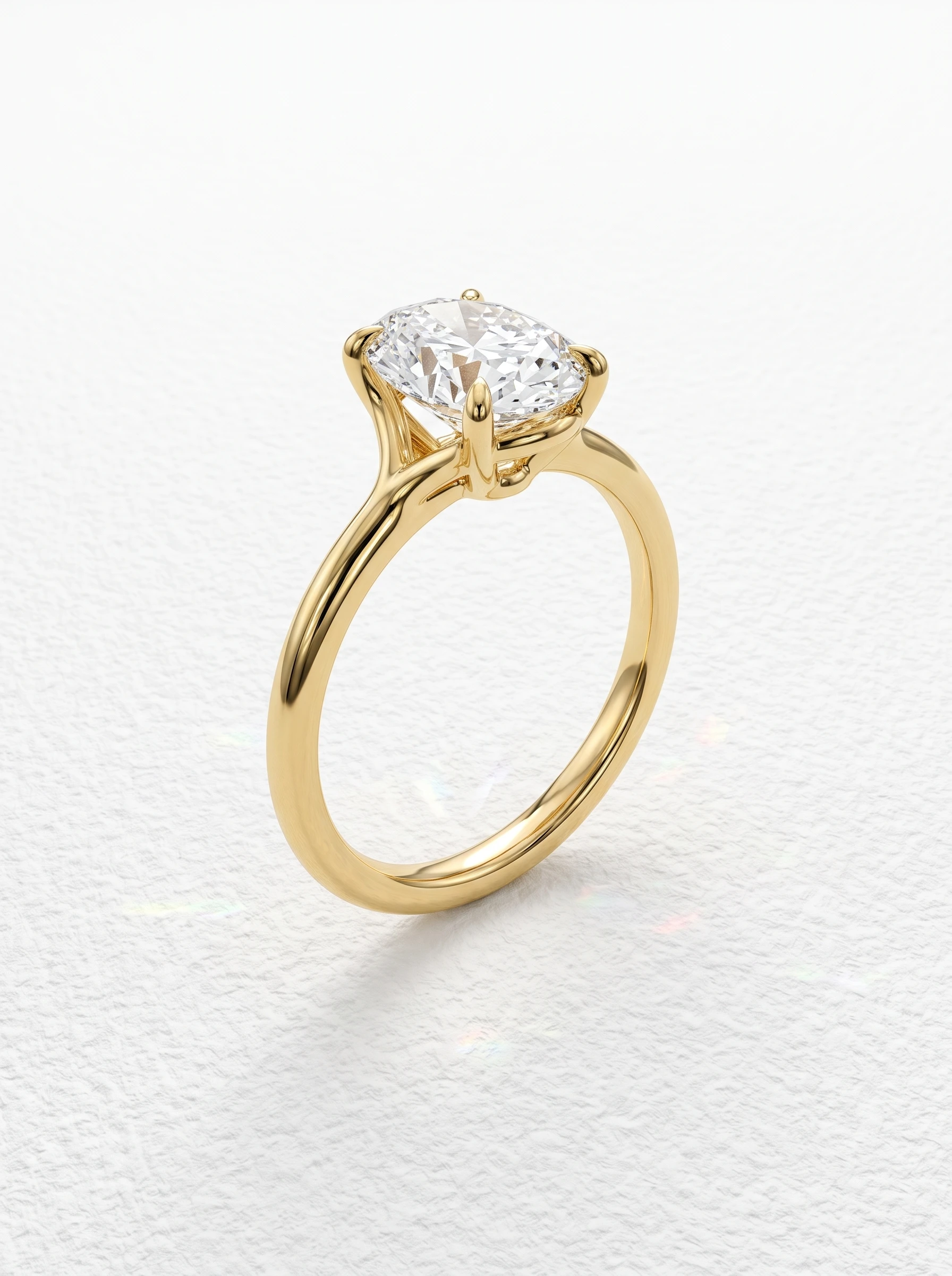 Oval four prong cathedral engagement ring in yellow gold standing upright, forked shoulders rising into claws