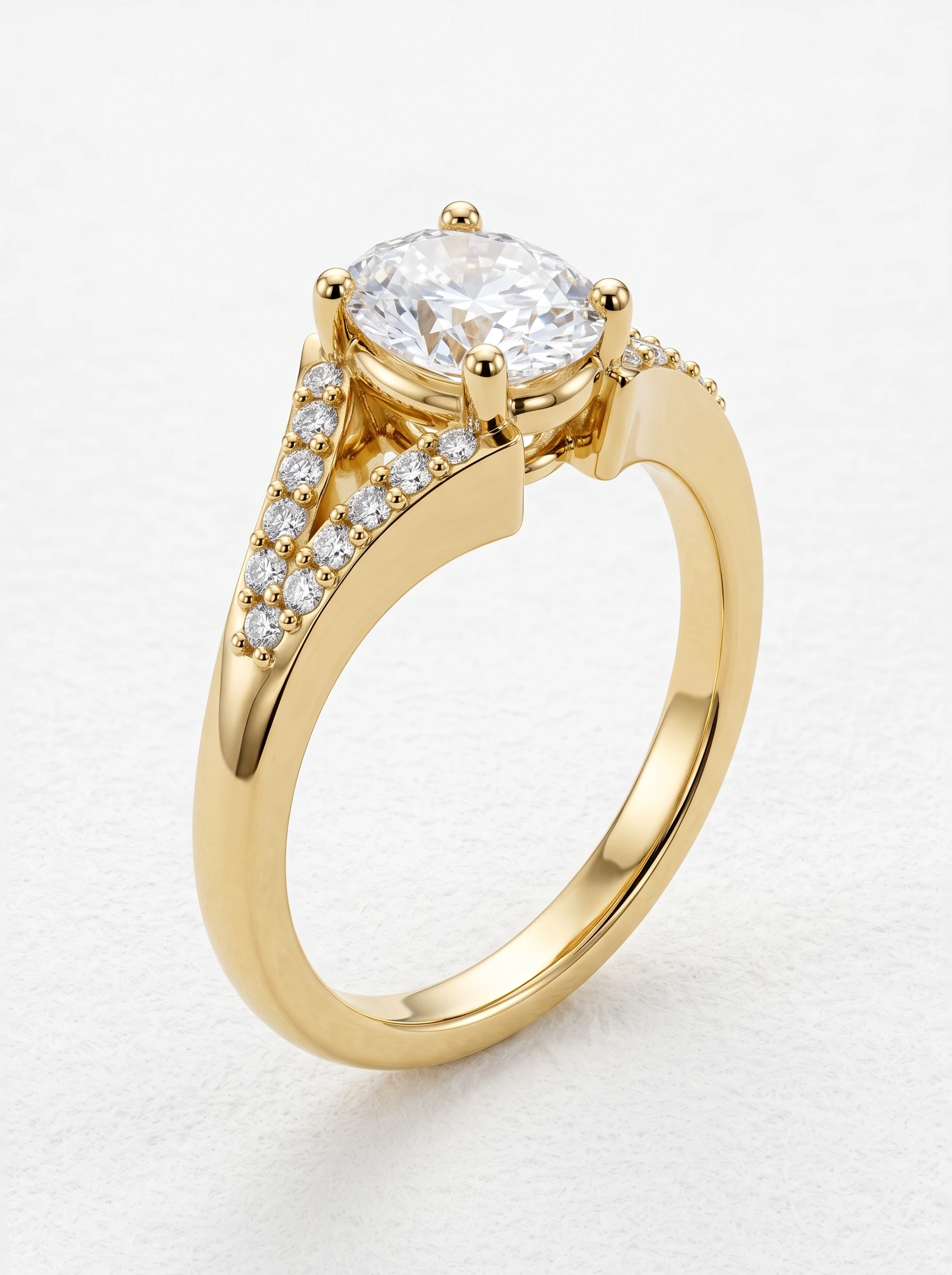 Oval split shank pave engagement ring in yellow gold standing upright, four round-tipped prongs and diamond arms