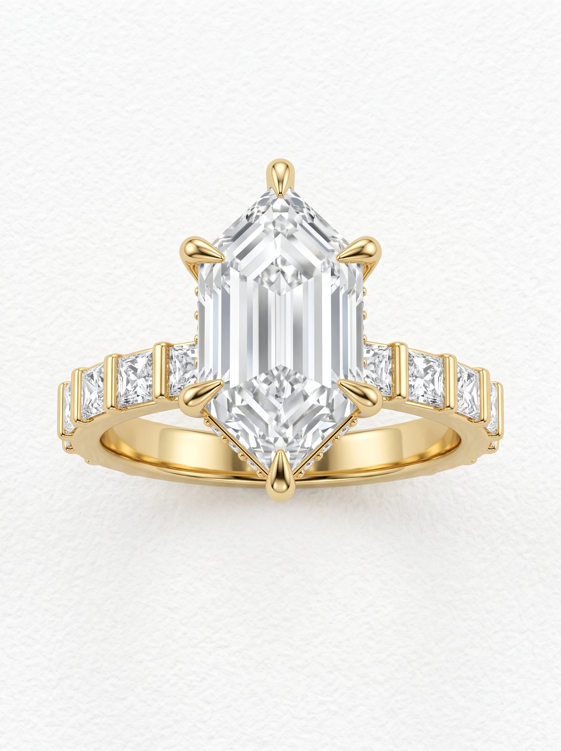 Elongated hexagon hidden halo engagement ring in yellow gold seen from the front, six teardrop prongs and bar-set band