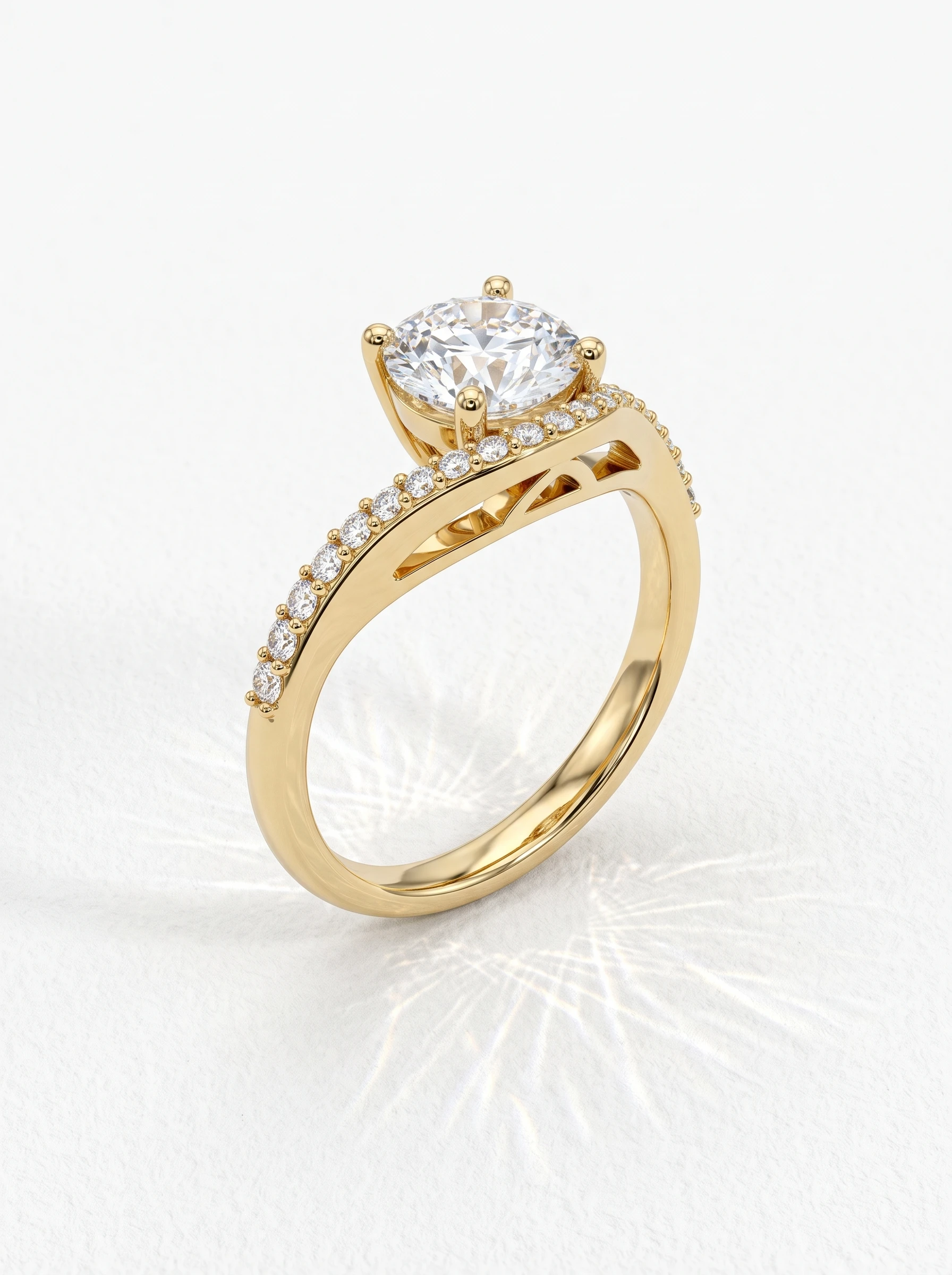 Round v shape pave engagement ring in yellow gold standing upright, four claw prongs and pavé-set arms