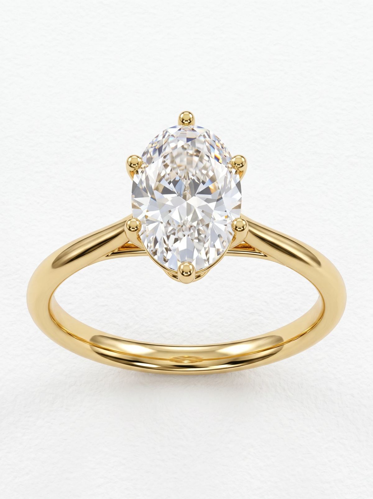 Bague de fiançailles ovale six griffes panier en or jaune, vue de face de la pierre ovale et de l'anneau poli