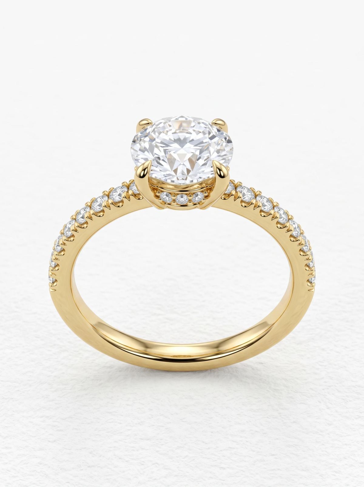 Bague de fiançailles ronde halo caché pavé en or jaune posée droite, quatre griffes et épaules pavées
